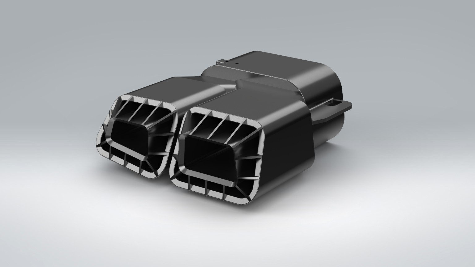 SolidWorks render of a paired set of black trapezoidal exhaust tips for a Mercedes-Benz CLS 63 AMG.
